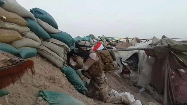 مقاتل مرابط بموضعه في سامراء لحماية المقدسات