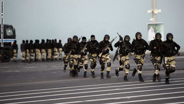 Members of the Saudi special police unit perform during a parade in Mecca, on September 28, 2014, as more than one million Muslims have arrived in the holy city in the lead up to the annual hajj pilgrimage. The hajj is one of the world's largest human gathering. AFP PHOTO/MOHAMMED AL-SHAIKH        (Photo credit should read MOHAMMED AL-SHAIKH/AFP/Getty Images)