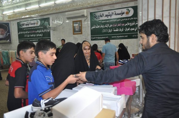  أكثر من ألفي يتيمٍ يستلمون كسوة عيد الفطر والعيدية في كربلاء المقدسة