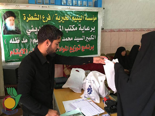 مؤسسة اليتيم الخيرية في الشطرة توزع المساعدات الغذائية علة عوائل الأيتام