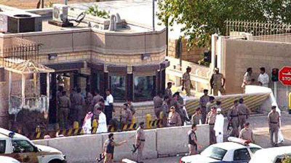 Saudi forces gather outside the gates of the U.S. consulate in Jiddah, Saudi Arabia, Monday, Dec. 6, 2004,  following a terrorist attack which killed at least 12 people.  Islamic militants threw explosives at the gate of the heavily guarded consulate in Jiddah, then forced their way in and held hostages at gunpoint,  in a bold assualt that prompted a three hour gunbattle. The Interior Ministry said three of the five attackers were killed.  (AP Photo/Saudi Gazette) ** SAUDI ARABIA OUT **