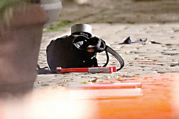 The pack back used to carry an explosive device is seen at the scene of a suicide attack in the southern German city of Ansbach on 25 June, 2016  A Syrian migrant set off an explosion at a bar in southern Germany that killed himself and wounded a dozen others late Sunday, authorities said, the third attack to hit Bavaria in a week. The 27-year-old, who had spent a stint in a psychiatric facility, had intended to target a music festival in the city of Ansbach but was turned away because he did not have a ticket.  / AFP PHOTO / dpa AND DPA / Daniel Karmann / Germany OUT