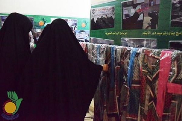 عوائل الأيتام والمتعففين يستلمون الملابس الشتوية النسائية من مؤسسة اليتيم الخيرية في الكاظمية المقدسة