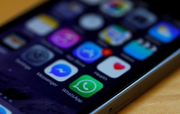 WhatsApp and Facebook messenger icons are seen on an iPhone in Manchester , Britain March 27, 2017. REUTERS/Phil Noble